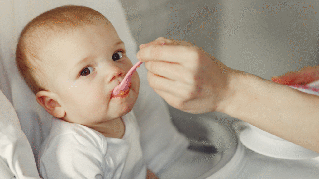 a baby taking gripe water